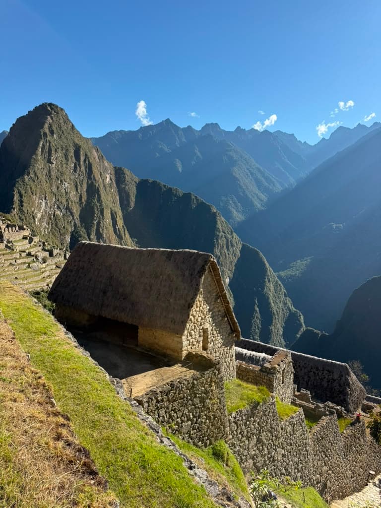 The thatched guardhouse of Machu Picchu above the Urubamba valley